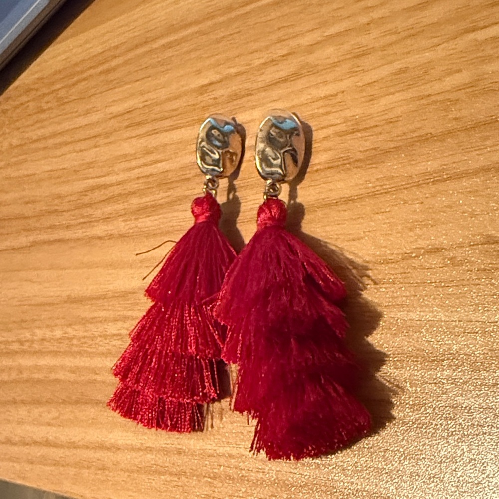 Red tiered statement earrings
